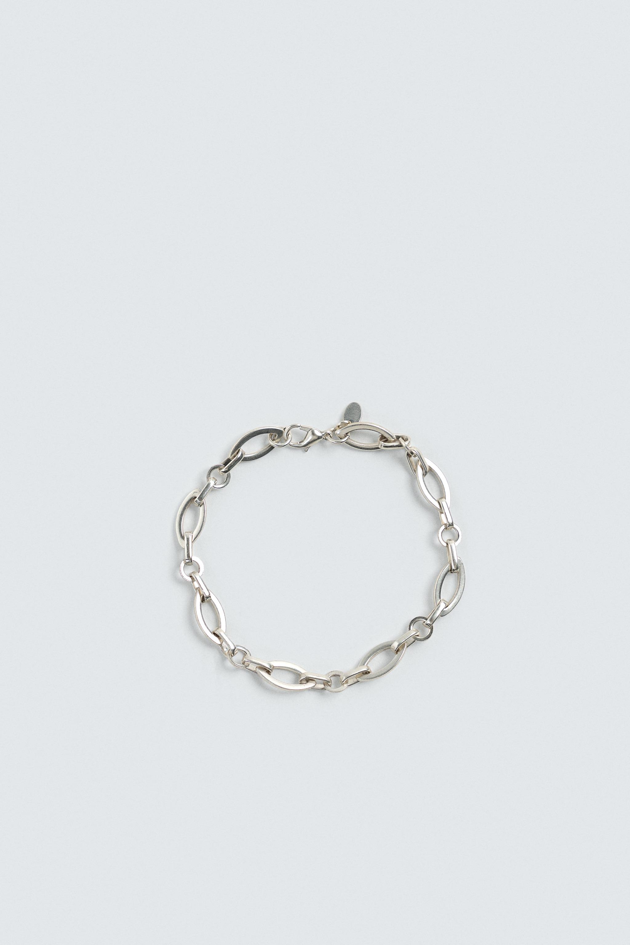 BRACELET À MAILLONS MÉTALLIQUES